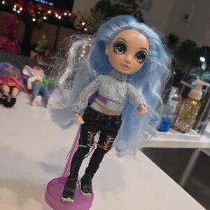 Rainbow Fashion Doll with Blue Hair and Colorful Outfit